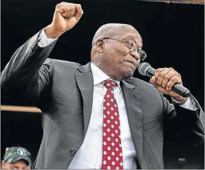  ?? Picture: AFP/GIANLUIGI GUERCIA ?? COURT APPEARANCE: Former president Jacob Zuma sings with supporters outside the Durban High Court after his court appearance