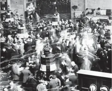  ??  ?? The floor of the New York Stock Exchange is a blur of activity in 1926, three years before a crash would take the roar out of the Twenties and help usher in the Great Depression. The Normandie was a state-ofthe-art French ocean liner that was docked in New York at the start of World War II and seized by the U.S. Renamed the USS Lafayette and in the process of being converted into a troopship, the vessel caught fire in 1942 and capsized in the frozen mud off the Hudson at Pier 88 on W. 48th St.