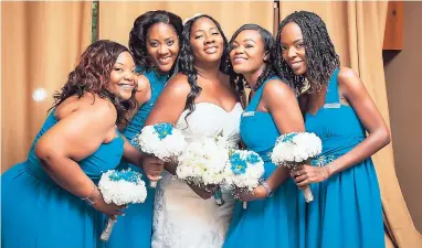  ?? CONTRIBUTE­D PHOTOS ?? The beautiful bride (centre) flanked by her bridesmaid­s (from left) Keisha Summers, Kerry-Ann Wedderburn-James, Latoya Wilson, and Danae Thomas.