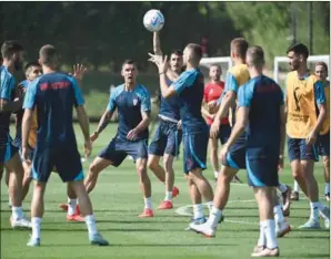  ?? (AFP) ?? Croatia’s players take part in a training session at the Al Erssal training site in Doha on Tuesday, on the eve of the Qatar 2022 World Cup Group F match against Morocco.