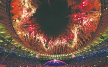  ??  ?? FIREWORKS EXPLODE during the opening ceremony of the Rio Olymics at Maracana Stadium on Friday.