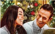  ?? CONTRIBUTE­D ?? “Christmas With You,” starring Aimee Garcia and Freddie Prinze Jr., has a musical angle and starts streaming on Netflix on Nov. 17.