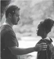  ?? ELIZA MORSE / FOX ?? Mark-paul Gosselaar and Saniyya Sidney star in The Passage, based on the dystopia novel by Justin Cronin.