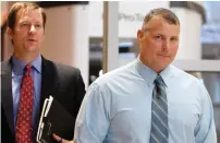  ?? AP file ?? Former CIA contractor Raymond Davis and his attorney William Frankfurt arrive at the Douglas County Courthouse in Castle Rock, Colorado, for a court hearing on a felony assault charges. —