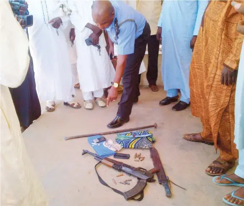  ??  ?? Arms recovered from the kidnappers by the police in Katsina State