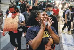  ?? Robert Gauthier Los Angeles Times ?? MIRACLE MURPHY protests Thursday in L.A. against the grand jury decision in the case of Breonna Taylor’s killing by Louisville, Ky., police officers.