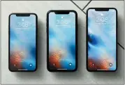  ?? RICHARD DREW— THE ASSOCIATED PRESS ?? From left, the iPhone XS, iPhone XR, and the iPhone XS Max are on display in NewYork.