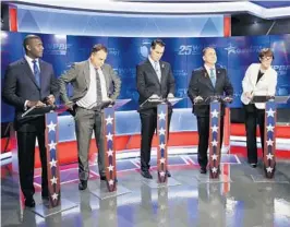  ?? BRYNN ANDERSON/ASSOCIATED PRESS ?? Democratic gubernator­ial candidates, from left, Andrew Gillum, Jeff Greene, Chris King, Philip Levine and Gwen Graham await the start of a debate in Palm Beach Gardens.