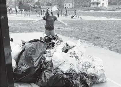  ?? CONTRIBUTE­D ?? Olivia Sullivan, a senior at Emmaus High School, organized an Earth Day cleanup at Jordan Park that drew 113 volunteers. They picked up 2,400 pounds of litter.