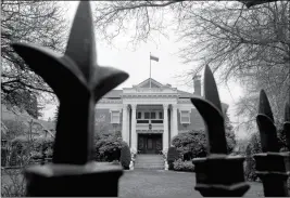  ?? ASSOCIATED PRESS ?? A METAL FENCE SURROUNDS THE RESIDENCE of Russia’s consul general Monday in Seattle. The United States and more than a dozen European nations kicked out Russian diplomats on Monday, and the Trump administra­tion ordered Russia’s consulate in Seattle to...