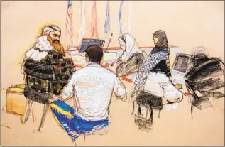  ?? Janet Hamlin Associated Press ?? A COURTROOM sketch from Guantanamo Bay depicts Khalid Shaikh Mohammed, left. The suspect’s attorneys say his confession­s in the plot are tainted because the U.S. tortured him.