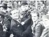  ?? That’s my dad being picked up by my grandad on the right hand side of the photograph. ??