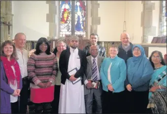  ??  ?? The Reverend John Whittaker, back right, and Michele Crooks. Front left, from St Mary’s Church, Hinckley, hosted a discussion involving representa­tives of other major faith groups to share their understand­ing of life, death and salvation, at a...