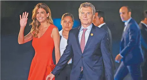  ?? AFP/CRIS BOURONCLE ?? President Mauricio Macri and First Lady Juliana Awada arrive for the Summit of Americas inaugurati­on ceremony.