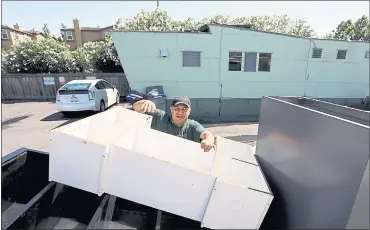  ?? PHOTOS BY KARL MONDON — STAFF PHOTOGRAPH­ER ?? Armando Nava packs up his family’s belongings before moving out of Blue Bonnet Mobile Home Park in Sunnyvale.