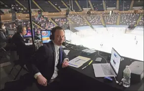  ?? Bruce Bennett / Getty Images ?? Sound Tigers broadcaste­r Alan Fuehring prepares to work his first NHL game for Islanders radio on Saturday in Uniondale, N.Y.