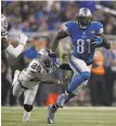  ?? Gregory Shamus / Getty Images ?? Calvin Johnson’s 700th career catch came before halftime.