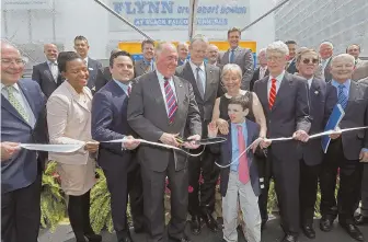  ?? STAFF PHOTOS BY JOHN WILCOX ?? A RAY OF CHANGE: Former Boston Mayor and U.S. Ambassador to the Vatican Raymond L. Flynn basks in the honor of having the Black Falcon Cruise Terminal renamed for him.