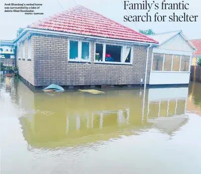  ?? PHOTO / SUPPLIED ?? Amit Bhardwaj’s rented home was surrounded by a lake of debris-filled floodwater.