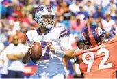  ?? JEFFREY T. BARNES AP ?? QB Josh Allen drives the Bills 70 yards in six plays for a TD against the Broncos before taking a seat.