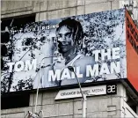  ?? NATRICE MILLER/NATRICE.MILLER@AJC.COM ?? Tom The Mail Man is one of the artists featured in the Tidal docuseries and on a billboard in downtown Atlanta.