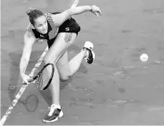  ??  ?? Czech Republic’s Karolina Pliskova in action during her second round women’s singles match against Russia’s Ekaterina Alexandrov­a. — Reuters photo