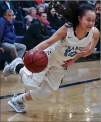  ?? PHOTOS BY KEITH THARP ?? Leland High School ‘s Karli Mukai (10) drives toward the basket in a 56-36Chargers’ victory over Leigh on Feb. 13.
