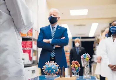  ?? EVAN VUCCI/AP ?? President Joe Biden visits the Viral Pathogenes­is Laboratory at the National Institutes of Health on Feb. 11 in Bethesda, Maryland.