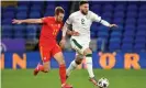  ?? Photograph: Peter Powell/EPA ?? Matt Doherty holds off Wales’s Rhys Norrington-Davies on Sunday.