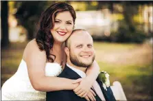  ?? (Special to the Democrat-Gazette) ?? Tori Sutton and Drew Carle exchanged their wedding vows on Oct. 3, 2020, in a small ceremony at Tori’s grandparen­ts’ home in Hot Springs. They had planned a more elaborate event for May but postponed due to the pandemic. “It actually ended up being like the most perfect day,” Tori says. “I’m so glad that it worked out the way it did.”