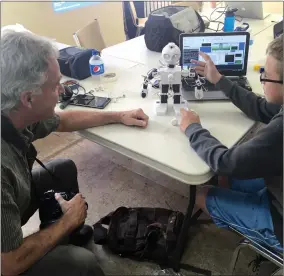  ?? Photos courtesy James Van Leeuwen ?? Left: An after-school drop-in program at the Pincher Creek RCADE. Above: Robotics programmer Matthias Eden at a Coder Rodeo event hosted by the RCADE.