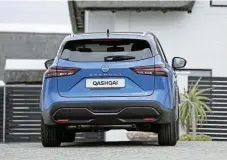  ?? ?? The Nissan Qashqai concept of a familyorie­ntated crossover has been refined for the better in the latest iteration. Right: Practicali­ty is assured with a large boot and seats that can be folded down but the manually operated tailgate is a letdown at the price.