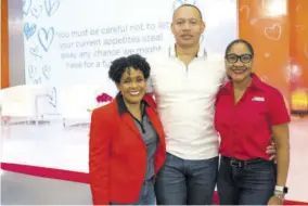  ?? ?? The JMMB team of (from left) Chief Marketing Officer Kerry-ann Stimpson; Alwayne Cousins, country manager, corporate client relationsh­ip; and Fornia Young, general manager, client partnershi­p, faced the camera.