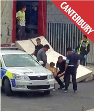  ??  ?? CA NT ER BU RYMaking it through: Police across southern England arrested alleged illegal immigrants yesterday after hundreds stormed the Channel Tunnel entrance in Calais