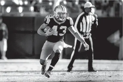  ?? Associated Press ?? Carolina Panthers running back Fozzy Whittaker runs the ball against the Washington Redskins on Nov. 22 at Bank of America Stadium in Charlotte, N.C.