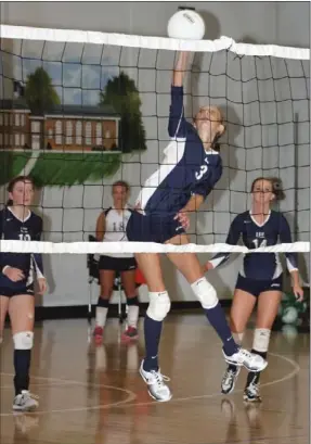  ??  ?? Gordon Lee sophomore Anna Pettigrew hammers home a shot during a home win over Coahulla Creek last week. (Messenger photo/Scott Herpst)