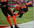  ?? NAJI SAKER — FOR THE NEWS-HERALD ?? Baker Mayfield reaches for the end zone during the Browns’ victory over the Bengals on Dec. 8 at FirstEnerg­y Stadium.