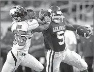  ?? NWA Democrat-Gazette/ANDY SHUPE ?? Darren McFadden (right) left the University of Arkansas in 2007 as the Razorbacks’ all-time leading rusher with 4,590 yards, which also ranks second-best ever in the SEC behind Herschel Walker’s career mark of 5,259.