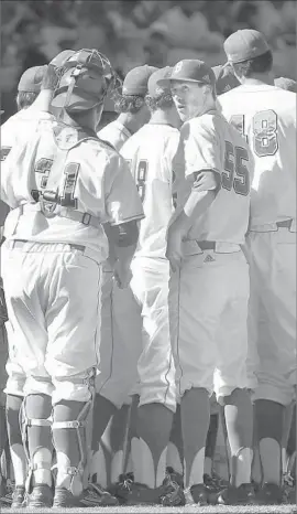  ?? Victor Decolongon Getty Images ?? UCLA PITCHER Griffin Canning, facing camera, missed the 2015 regional because of a back injury. UCLA’s loss to Maryland was “tough to watch,” he said.