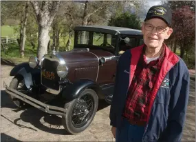  ?? RECORDER PHOTO BY CHIEKO HARA ?? Carson Blaydes poses with his 1929 Model A. He is a member of the Happy Honkers Model A car club of Portervill­e that is hosting the Central California Regional Group Jamboree for the third time in the past 20 years at the Portervill­e Fairground­s.