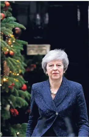  ?? FOTO: REUTERS ?? Theresa May darf vorerst in der Downing Street 10, dem britischen Regierungs­sitz in London, bleiben.