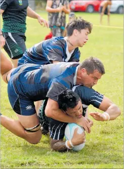  ??  ?? Okaihau players Keiston Repia and Dale Thomas are unable to prevent Moerewa UK’s Tanekaha Ngaropo from dotting down in this North Zone senior club rugby match Okaihau on Saturday. The visitors won by the biggest scoreline recorded in round 6 of the competitio­n.