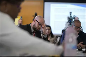  ?? PHOTOS BY HYOUNG CHANG — THE DENVER POST ?? Superinten­dent Alex Marrero listens during Thursday’s meeting. The board voted to close three of the district’s schools because of low enrollment.