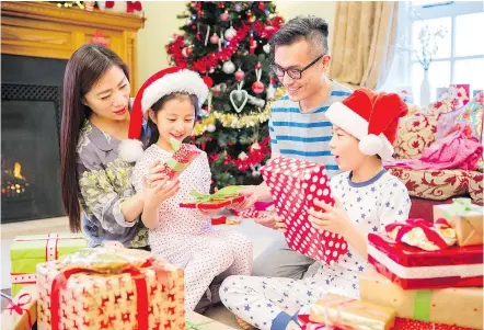  ?? — PHOTOS: GETTY IMAGES FILES ?? Just like us, kids want what they want when they want it, never more so than during the holiday season when presents loom largest. Teaching self-restraint is a good thing at any age.