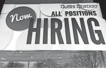  ?? NAM Y. HUH/AP FILE ?? The high number of job openings suggests the economy is not yet in recession or close to falling into one. Typically businesses stop advertisin­g job openings as the economy stumbles.