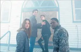  ?? Chris Reardon Spike ?? DANICA CURCIC, Morgan Spector, Russell Posner and Okezie Morro play small-town residents threatened by “The Mist,” new this summer on Spike TV.