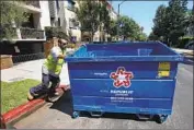  ?? Mel Melcon Los Angeles Times ?? A DEAL between the city and trash haulers ends a 15-month dispute over RecycLA fees, which in many cases added hundreds of dollars to customers’ bills.