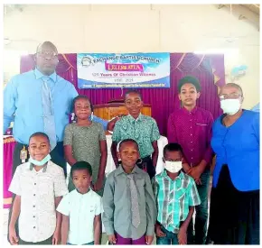  ?? ?? Students of the Exchange Baptist Church Sunday School Department pose along with their teachers Oral Coombs (left, back row0 and Carlene Sewell (right, back row).