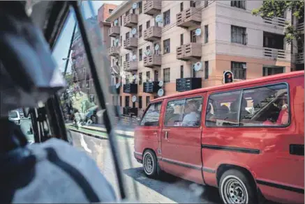  ??  ?? On the move: Taxis — Quantams, Siyayas, Ventures, Caravellas — are integral to the way people experience life in South Africa. Photo: Oupa Nkosi