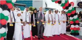  ??  ?? ABU DHABI: Left to right opening the UAE National Day street festival at Etihad Aviation Group are: Sultan Mohamed Al Mahmoud, Vice President - Chairman’s Program Management Office; Fatma Al Sahlawi, Head of UAE National Developmen­t; Ray Gammell, Group...